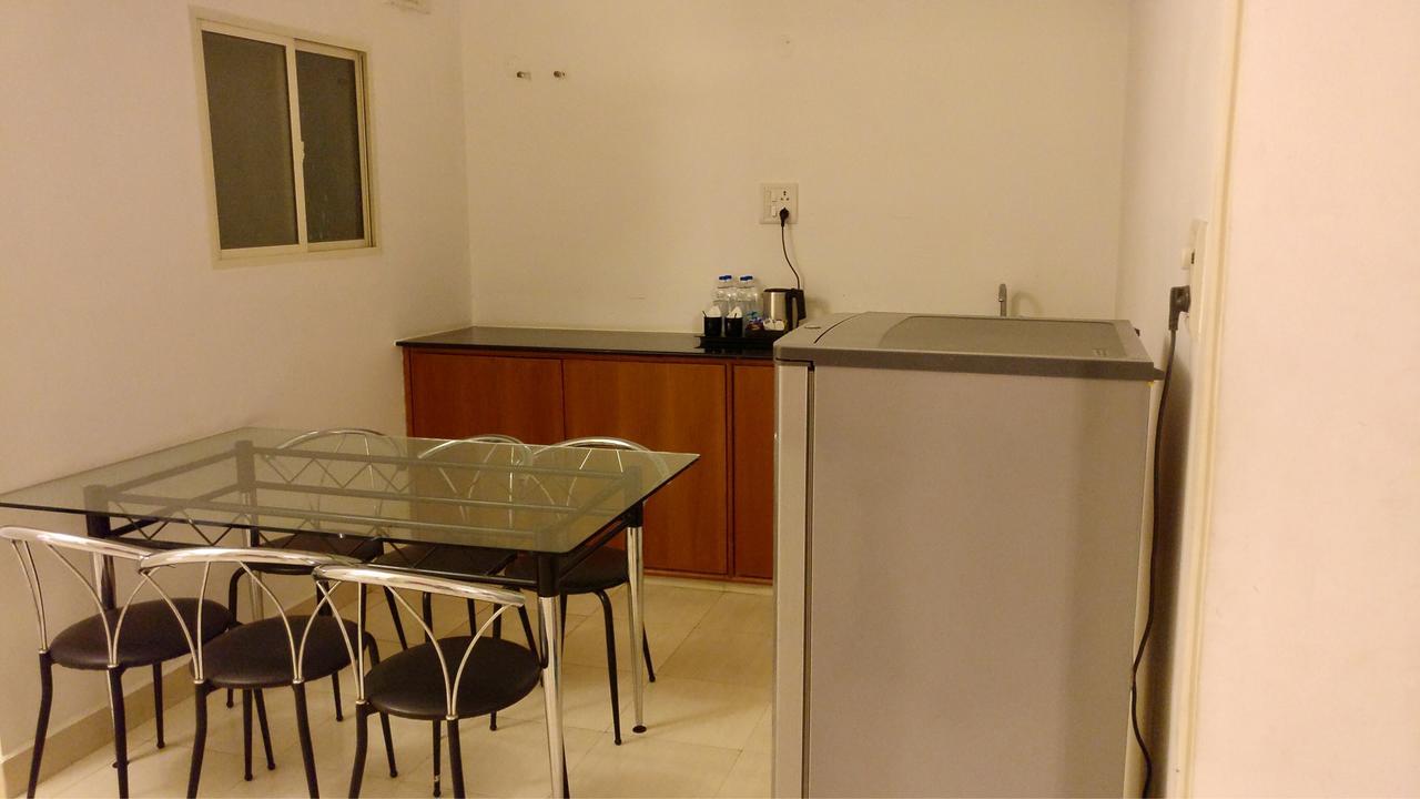 Sai Towers Hotell Puttaparthi Exteriör bild